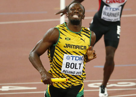 Bolt tươi cươi sau khi về nhất nội dung 4x100m.
